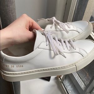 Woman by Common Projects white sneakers